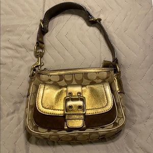 Gold coach shoulder bag